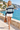 Female promenade look with ivory shorts
