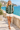 Female promenade look with ivory shorts