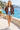 Floral bomber styled with denim shorts
