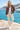 Floral bomber styled with sand-colored joggers