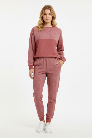 Front studio view of the female model wearing the matching rose set