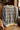 Geometric sweater draped over leather