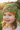 Girl age 4 wearing dinosaur beanie