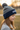 Girl age 9 wearing grey and navy beanie