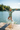 Girl Jumping into Lake