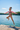Girl Jumping into Lake