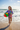 Girl Running with Beach Ball