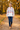 Girl wearing the white hoodie in an autumn park