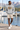 Heather grey hoodie with sand shorts on a male model