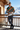 Hoodie on a ski chalet terrace overlooking snowy mountains