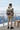 Hoodie rear view on a snowy chalet terrace
