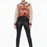 Abstract art sweater with black leather pants for edgy modern style