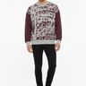 Distressed texture sweater with black jeans for modern casual aesthetic