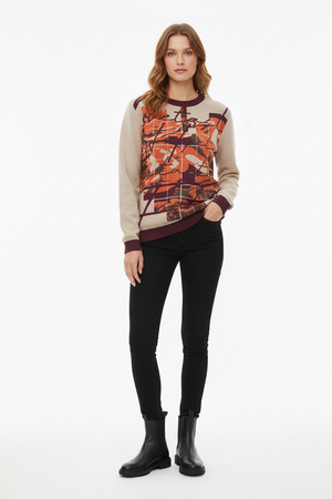 Abstract art sweater with black jeans for modern casual aesthetic