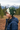 Boy side profile wearing wilderness print beanie