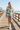Knitted hoodie beach boardwalk editorial