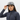 Latina woman in gray snapback