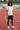 Leggings with black sports shorts on an athletics track