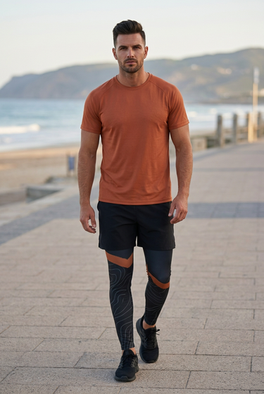 Leggings with running shorts on a coastal promenade