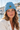 Light Avio Blue beanie at marina