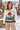 Look 1: female model, ski village