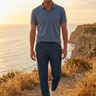 Male coastal editorial with blue polo and constellation joggers