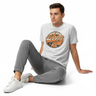 Male model in white fleck tee with gray joggers