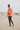 Male model showcasing the sweatshirt back with joggers
