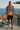 Male model wearing the hoodie with black shorts