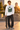 Male model wearing the ODDSON long-sleeve tee at a skate plaza