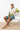 Male model with board shorts sitting beach vibe