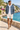 Male promenade look with open windbreaker and ivory shorts