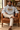 Male reading-chair look in the heather-grey hoodie