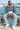 Male seated marina look with light-wash jeans