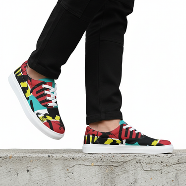 Man wearing colorful lace-ups with cargo pants on ledge