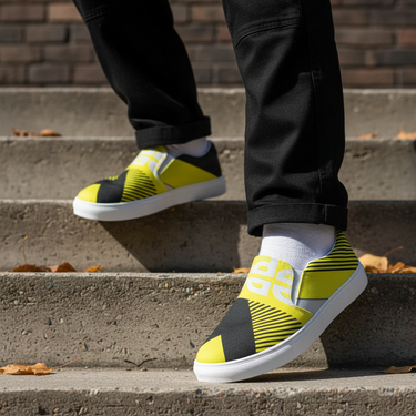 Man wearing yellow and black slip-ons with cargo pants on stairs