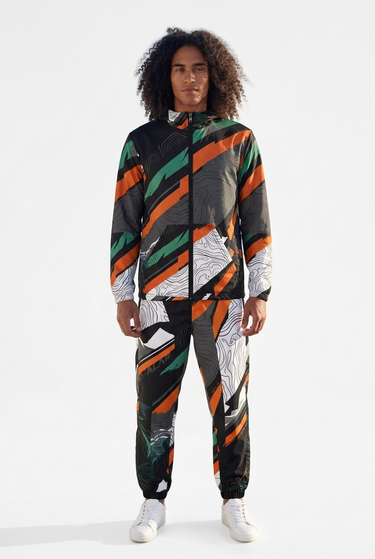 Matching jacket and track pants, front view on white