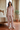 Matching short-sleeved floral pajama set in a coastal suite