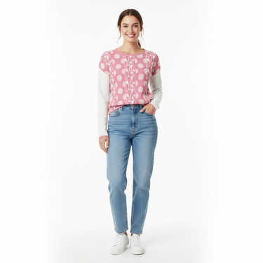 Model in sweater with jeans on white background