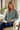 Model reading in the palm-print pajama top