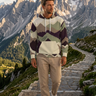 Mountain-print hoodie styled on an alpine trail
