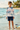 Pastel palm rash guard editorial look