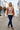 Pear V-neck sweater styled with dark denim