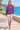 Promenade model wearing the tropical hoodie with gradient joggers