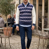 Quarter-zip layered over a blue Oxford shirt