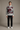 Quarter-zip sweater in a minimalist studio