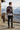 Quarter-zip sweater rear view on a mountain terrace