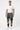 Racing joggers styled on a white studio background