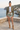 Shorts with olive utility jacket
