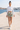 Shorts with white crop top